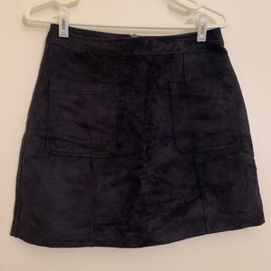 Black velvet skirt with front pockets
